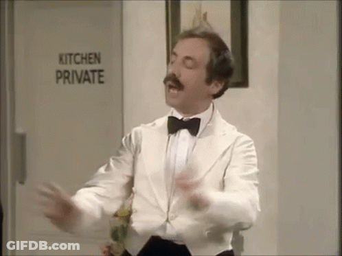 Man In White Tuxedo Dancing In Front Of Kitchen Private Sign GIF