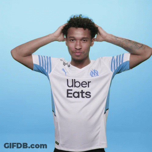 Man In White Uber Eats Shirt Holding Head GIF