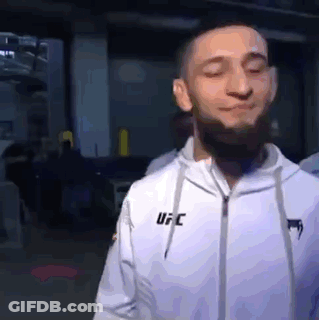 Man In White UFC Jacket Eyes Closed GIF