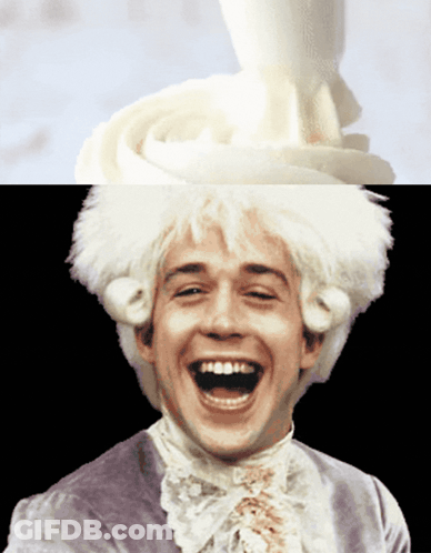 Man In White Wig Laughing With Whipped Cream Swirl GIF