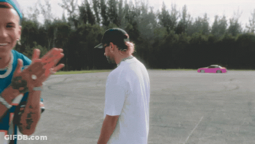 Man In White With Pink Car Parking Lot GIF