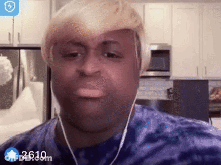 Man In Wig And Earphones Making Funny Face GIF