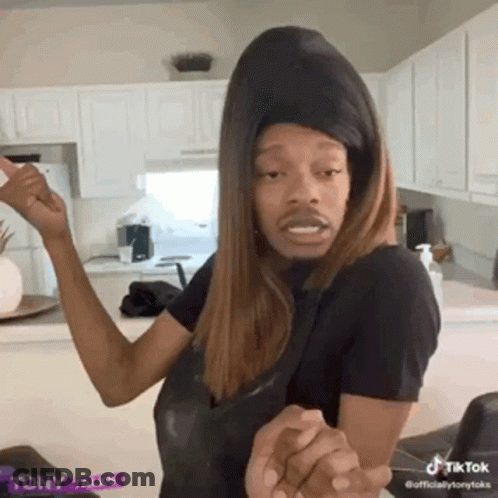 Man In Wig And Hat In Kitchen GIF