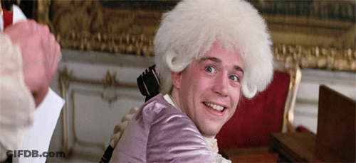 Man In Wig And Pink Shirt Smiling GIF