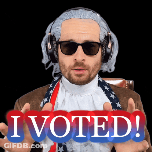 Man In Wig And Sunglasses Holding I Voted Sign GIF