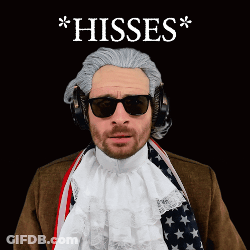 Man In Wig And Sunglasses In Front Of Hisses Sign GIF