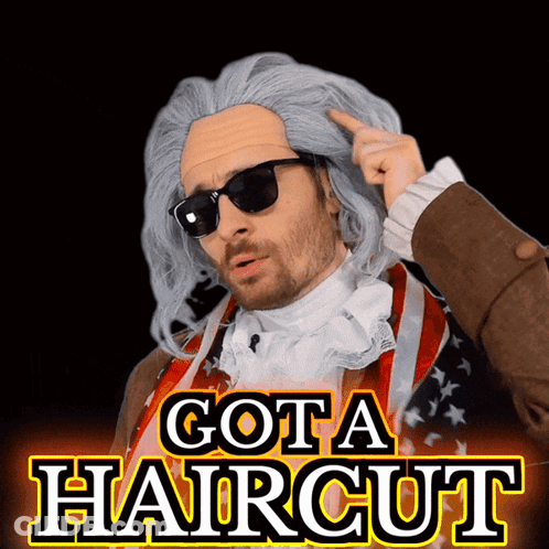 Man In Wig And Sunglasses Pointing At Head With Got A Haircut GIF