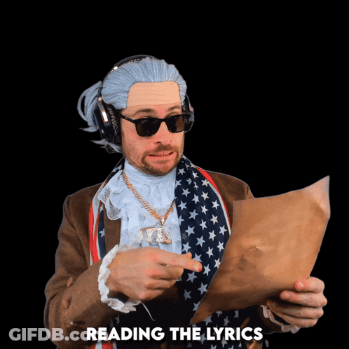 Man In Wig And Sunglasses Reading Song Lyrics GIF
