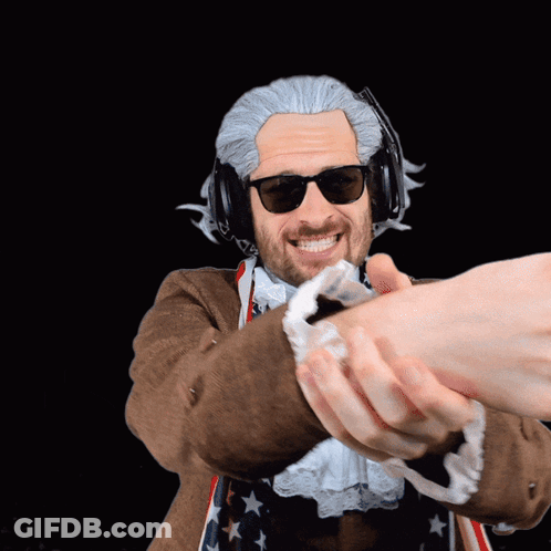 Man In Wig And Sunglasses Shaking Hands GIF