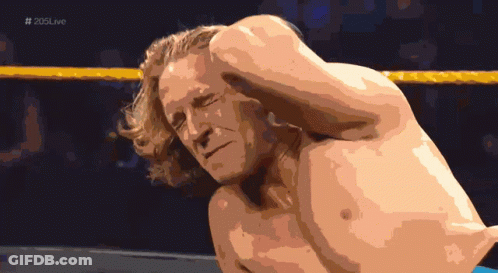 Man In Wig And Sunglasses With Headphones GIF