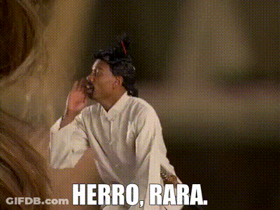 Man In Wig And White Shirt Saying Herro Bara GIF