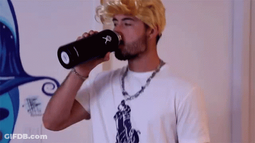 Man In Wig Drinking From Bottle GIF