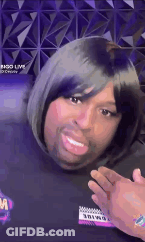 Man In Wig Making Funny Face Talking GIF