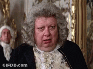 Man In Wig Making Funny Face With Others GIF