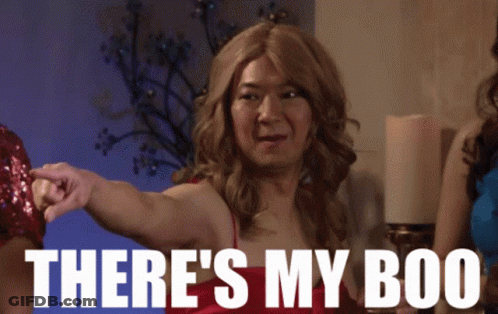 Man In Wig Saying There's My Boo Pointing GIF