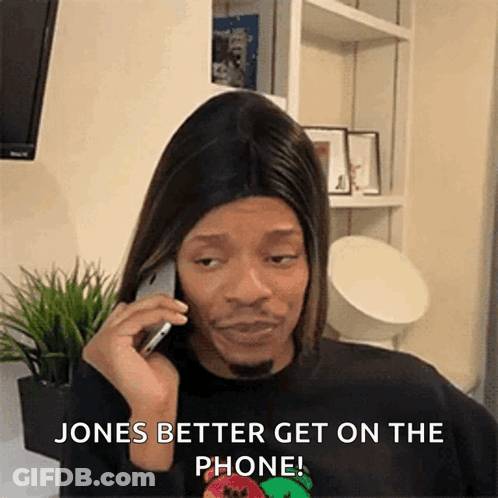 Man In Wig Talking On Phone GIF