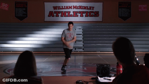 Man In William McKinley Athletics Shirt Dancing GIF