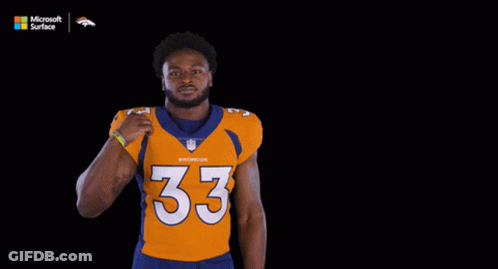 Man In Williams Jersey Flexing Muscles GIF