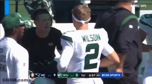 Man In Wilson Number 2 Jersey Talks To Coach GIF