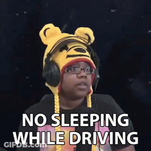 Man In Winnie The Pooh Hat And Headphones Making Funny Face While Driving GIF