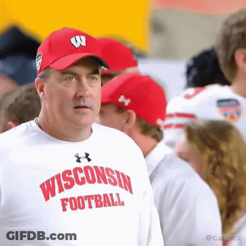 Man In Wisconsin Football Shirt And Red Hat GIF