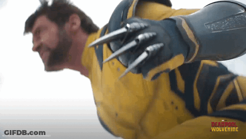 Man In Wolverine Costume Flying GIF