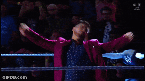 Man In Wrestling Ring Arms Outstretched GIF