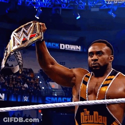 Man In Wrestling Ring Holding Championship Belt GIF