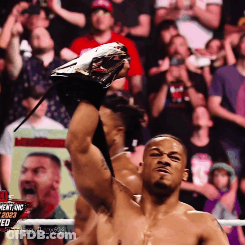 Man In Wrestling Ring Holding Trophy #Tiffanyluv24 GIF