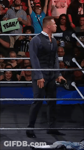 Man In Wrestling Ring Holding Yeah Sign GIF