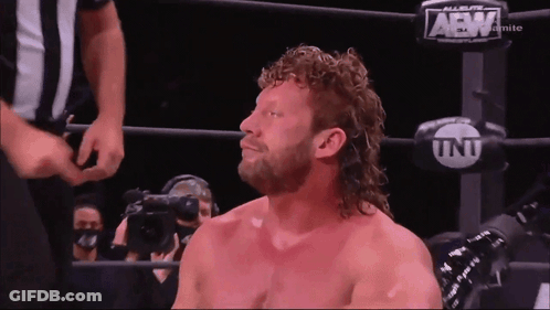 Man In Wrestling Ring With AEW Gloves GIF
