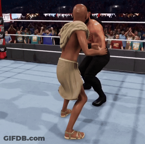 Man In Wrestling Ring With Apollo T-Shirt GIF