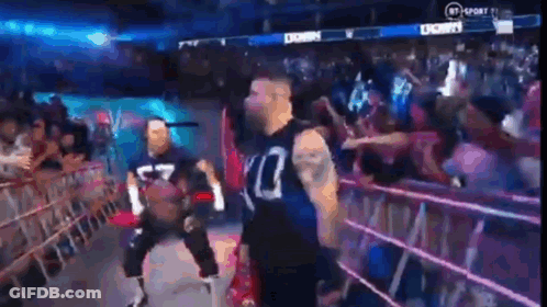 Man In Wrestling Ring With Crowd GIF