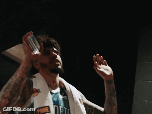 Man In Wrestling Ring With Crowd Watching GIF