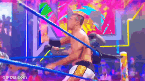Man In Wrestling Ring With Crowd GIF