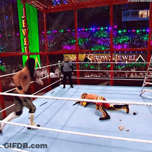 Man In Wrestling Ring With Crown Jewel Sign GIF