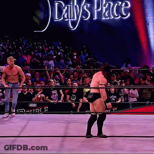 Man In Wrestling Ring With Daily's Place Sign GIF