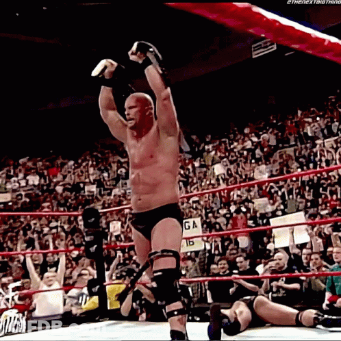 Man In Wrestling Ring With GA Sign GIF