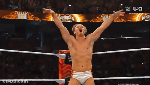 Man In Wrestling Ring With Main Event Sign GIF