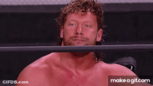 Man In Wrestling Ring With Make A Git.com Button GIF