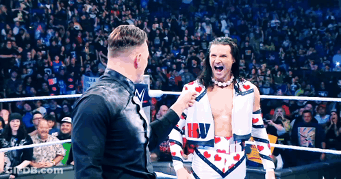 Man In Wrestling Ring With NBV Shirt GIF