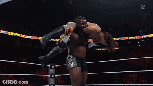 Man In Wrestling Ring With Next Turn Sign GIF