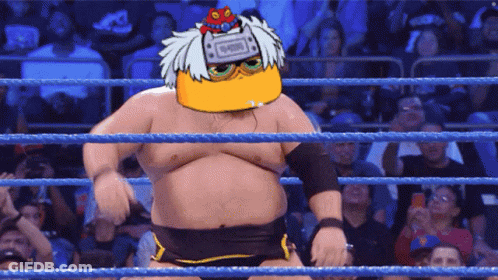 Man In Wrestling Ring With Ninja On Head GIF