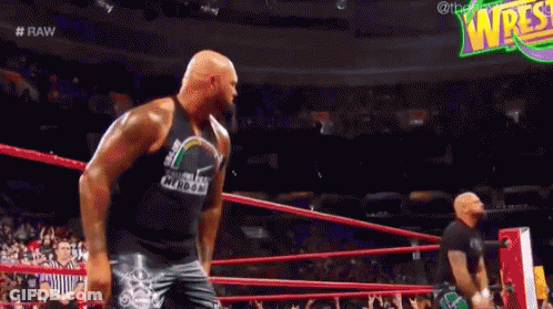 Man In Wrestling Ring With Referee GIF