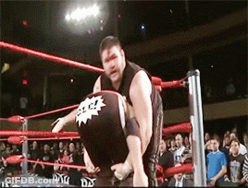 Man In Wrestling Ring With Smack Sticker GIF