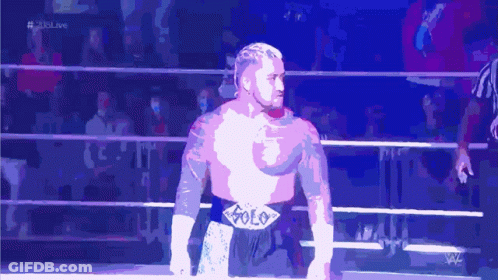 Man In Wrestling Ring With Solo Belt GIF
