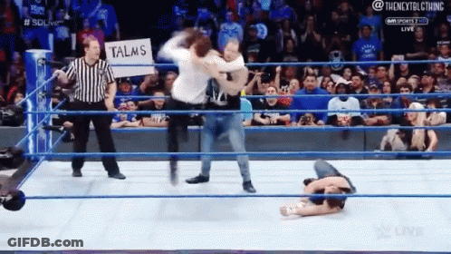 Man In Wrestling Ring With Talms Sign GIF