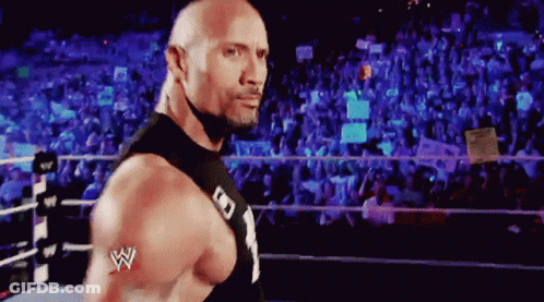 Man In Wrestling Ring With W Logo GIF
