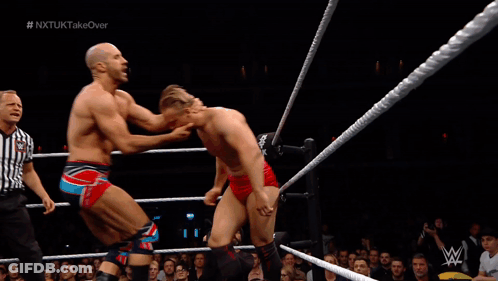 Man In Wrestling Ring With W Logo GIF