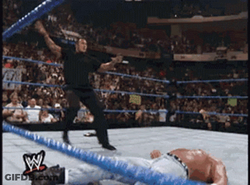 Man In Wrestling Ring With W Logo GIF